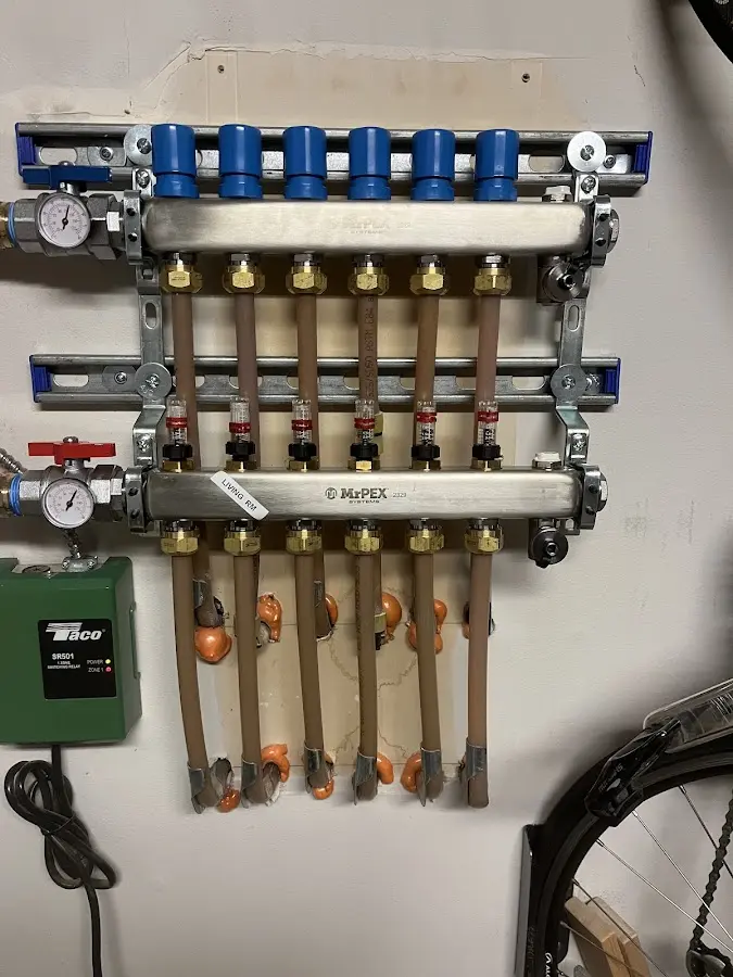 Plumber performing Gas Line Installation at a residential property in Larkspur